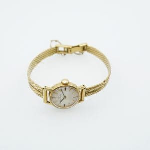 Armbandsur Movado Guld 18K Längd 17cm Boett 19mm Manuell Plastglas Bruttovikt 24,4g Armlänk Guld 18K