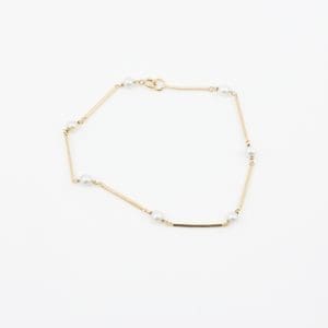Armband Guld 18K 3,4g Längd 20,5cm Bredd 1-4mm med pärlor