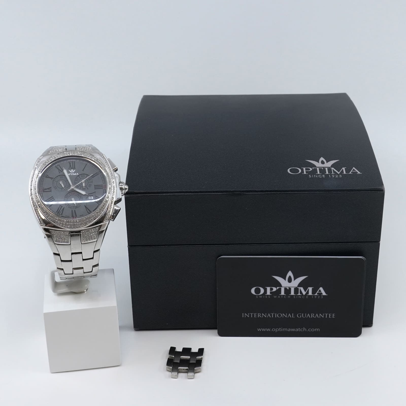 Armbandsur Optima modell OPTIMA OSC292-SS-D-2 Stål Längd 21+2cm Boett 46mm med diamanter och box