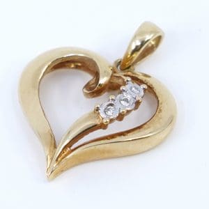 Hänge Guld 18K 3,1g Bredd 19mm Höjd 23mm med diamanter 3xca0,01ct