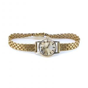 Damur Omega Guld 18K i armband, 14K i boett, boett 19mm, graverad baksida, tickar ej, 22,6g.