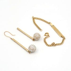 Investeringsguld 18K 5,23g med stenar, skadat