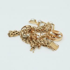 Investeringsguld 18K 37,4g, graverat, skadat
