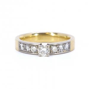 Sidostensring Guld / Vitguld 18K 8,7g Ø19,50 med diamanter 7x totalt ca 0,94ct