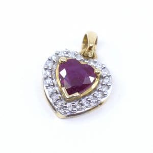 Hänge Hjärta Guld 18K 0,9g Bredd 9,3mm Höjd 9,3mm med diamanter 20x ca 0,001ct & hjärtslipad rubin
