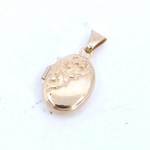 Medaljong Guld 09K 0,7g Bredd 11mm Höjd 20mm mönstrad