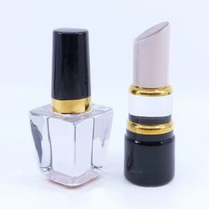Konstglas Kosta Boda nagellack och läppstift från serien Make Up av Åsa Jungnelius Höjd: ca 13cm.