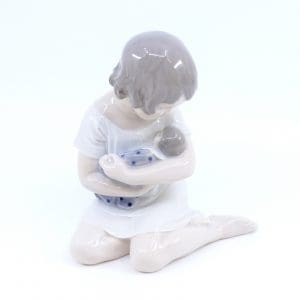 Figurin Royal Copenhagen Höjd 12,5cm Flicka med bebis