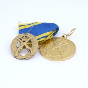 Investeringssilver 28,9g 2 st förgylda medaljer ögla och nål ej silver