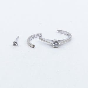Investeringsguld 18K 2,6g, innehåller diamanter ca0,20ct