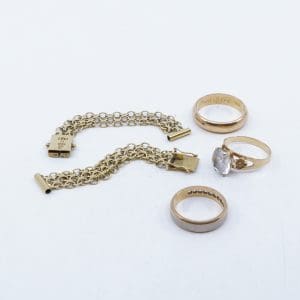 Investeringsguld 18K 27g, innehåller klocklänk, stenar