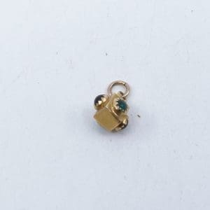 Investeringsguld 18K 1,3g med färgade stenar