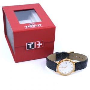 Armbandsur, Tissot, Guld 18K, 34mm, quartz, i behov av batteribyte, datum, gravyr, box