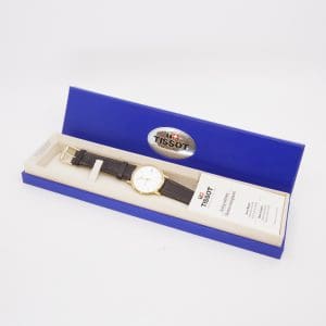 Armbandsur Tissot Guld 18K Boett 33mm quartz/går ej datum graverad boett med läderarmband