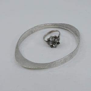 Investeringssilver S925 25,2g skevt/missfärgat med stenar