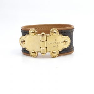 Armband Louis Vuitton "Save it" monogram läder storlek 17 modell: M6611
