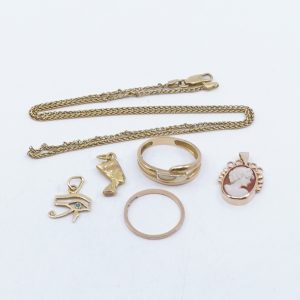 Investeringsguld 18K 17,2g, med stenar, defekt