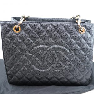 Väska Chanel Grand Shopping Tote, svart kaviarläder, guldfärgade beslag, skadad med tillbehör