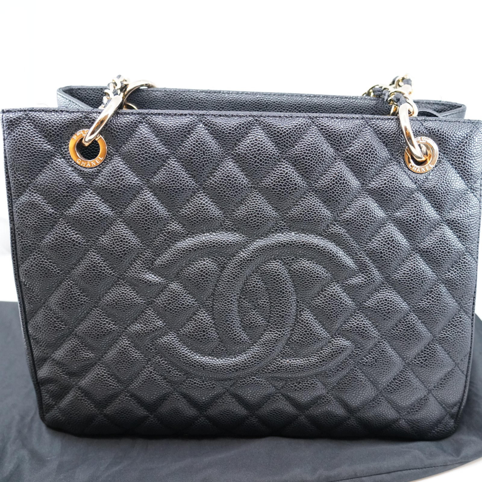 Väska Chanel Grand Shopping Tote, svart kaviarläder, guldfärgade beslag, skadad med tillbehör
