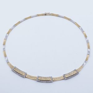 Halskedja tvåfärgad Guld 18K 29g Längd 42cm Bredd 4-9mm, med stenar